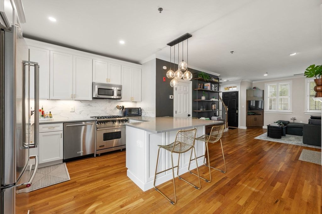 Interior, Kitchen, Pendant Lights, Recessed Lighting, Stainless Steel Appliances, Wood Texture Flooring