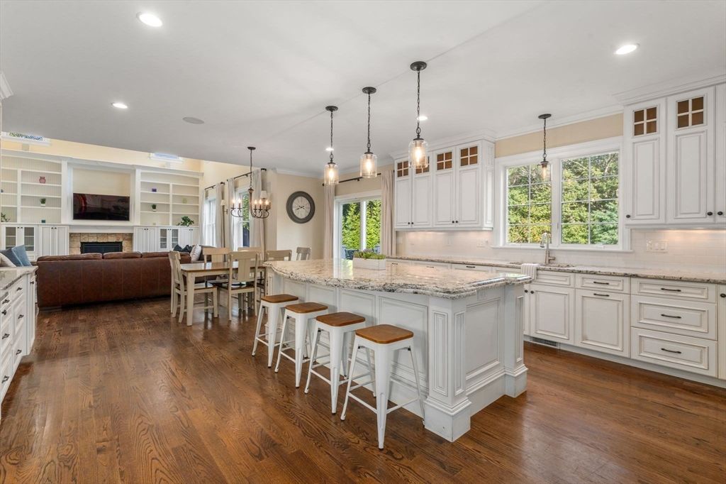 Chandelier, Dining room, Fireplace, Interior, Kitchen, Living room, Pendant Lights, Recessed Lighting, Wood Texture Flooring