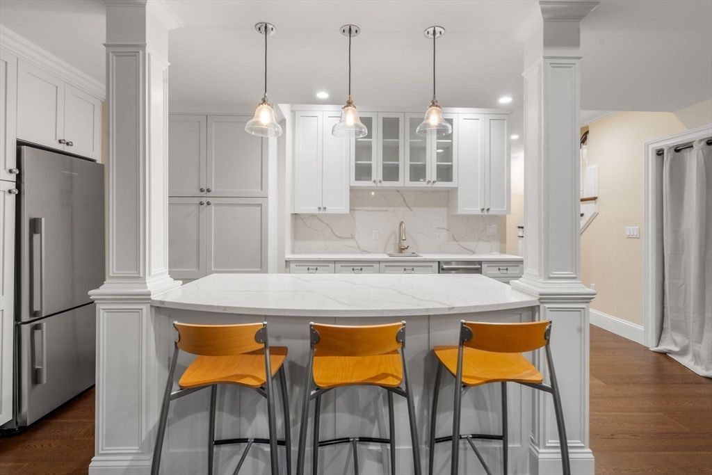 Interior, Kitchen, Marble Walls, Pendant Lights, Recessed Lighting, Wood Texture Flooring