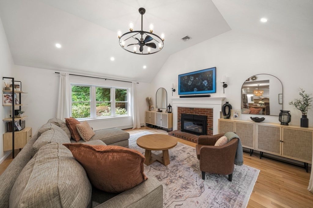 Chandelier, Fireplace, Interior, Living room, Pendant Lights, Recessed Lighting, Wood Texture Flooring