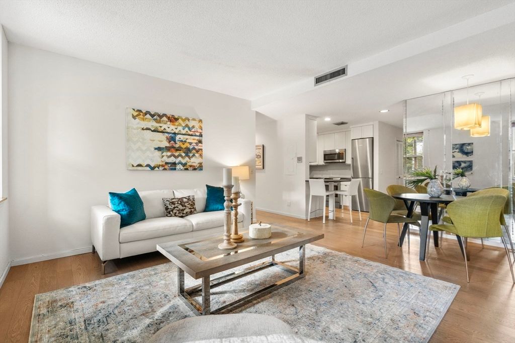 Dining room, Interior, Kitchen, Living room, Recessed Lighting, Stainless Steel Appliances, Wood Texture Flooring