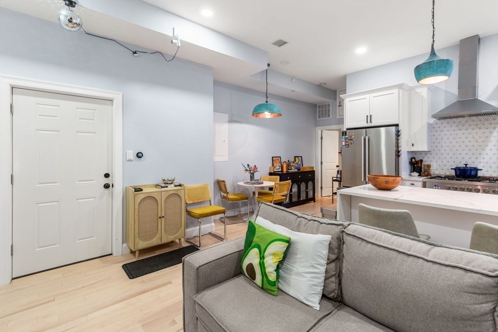 Dining room, Interior, Kitchen, Living room, Pendant Lights, Recessed Lighting, Stainless Steel Appliances, Wood Texture Flooring