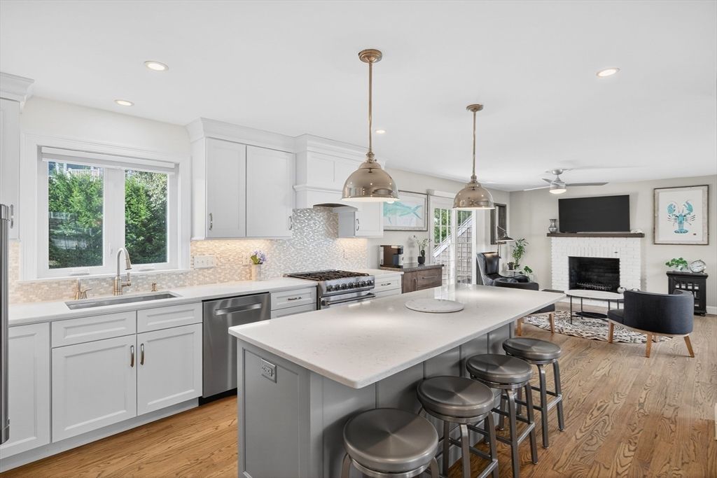 Fireplace, Interior, Kitchen, Pendant Lights, Recessed Lighting, Stainless Steel Appliances, Wood Texture Flooring