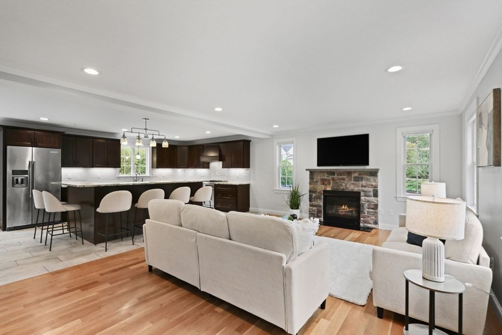 Fireplace, Interior, Kitchen, Living room, Pendant Lights, Recessed Lighting, Stainless Steel Appliances, Wood Texture Flooring