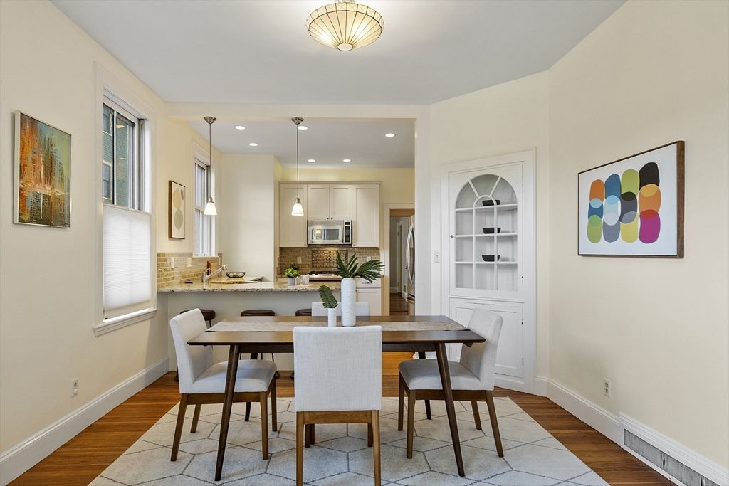 Dining room, Interior, Kitchen, Pendant Lights, Recessed Lighting, Stainless Steel Appliances, Wood Texture Flooring