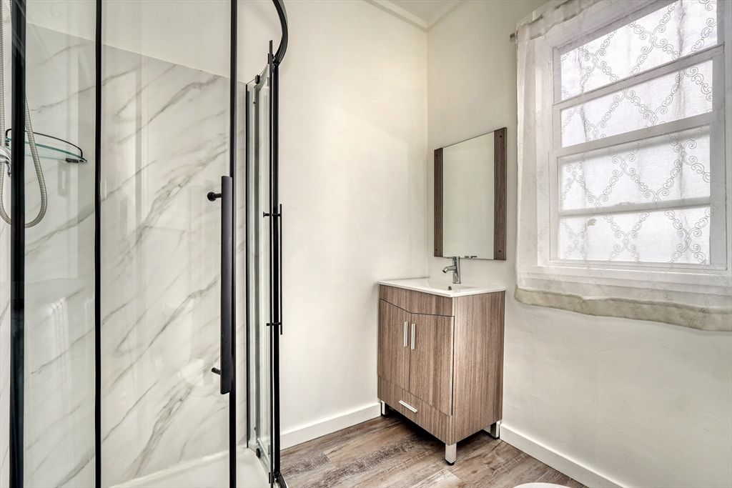 Bathroom, Glass Shower, Interior, Marble Walls, Wood Texture Flooring