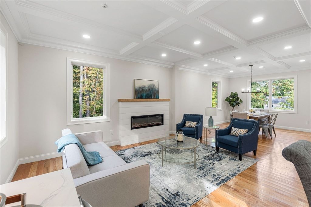 Dining room, Fireplace, Interior, Living room, Pendant Lights, Recessed Lighting, Wood Texture Flooring