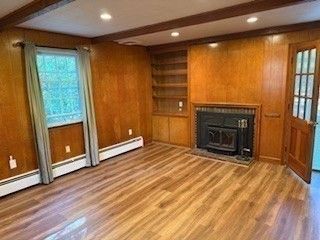 Empty room, Fireplace, Interior, Recessed Lighting, Wood Texture Flooring, Wooden Walls