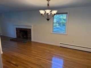 Chandelier, Empty room, Fireplace, Interior, Wood Texture Flooring