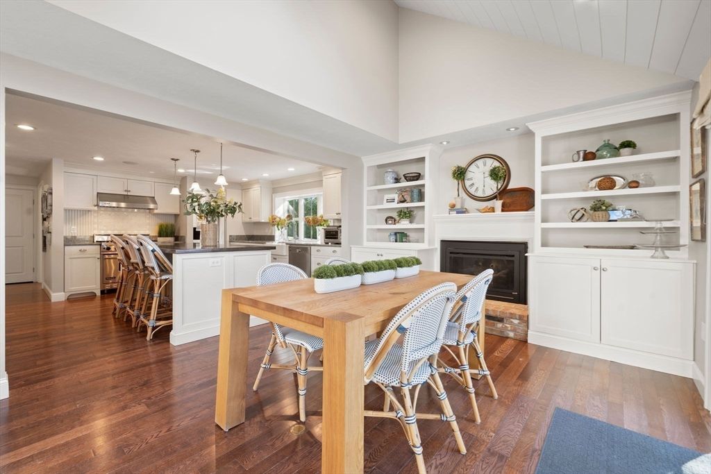 Dining room, Fireplace, Interior, Kitchen, Pendant Lights, Recessed Lighting, Stainless Steel Appliances, Wood Texture Flooring