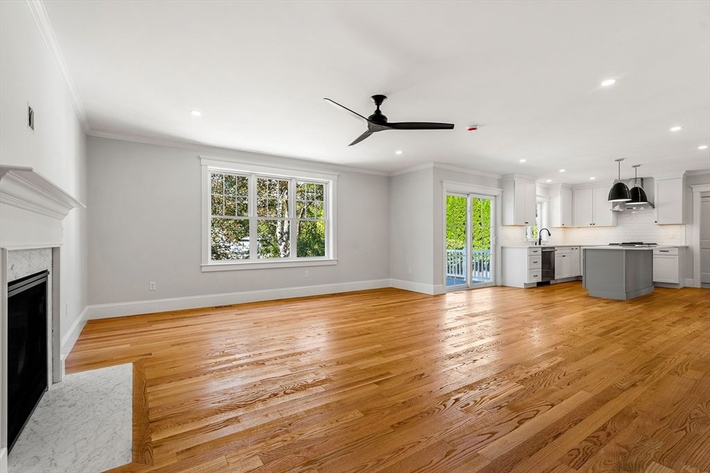 Empty room, Fireplace, Interior, Kitchen, Recessed Lighting, Wood Texture Flooring