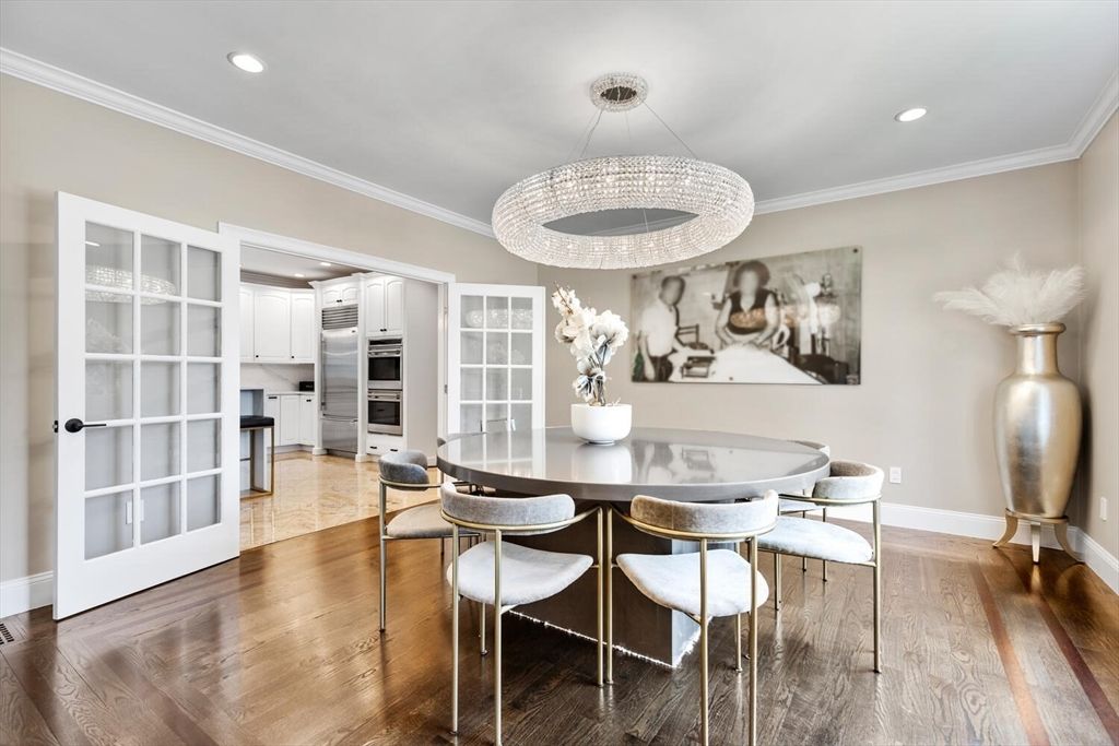 Chandelier, Dining room, Interior, Kitchen, Pendant Lights, Recessed Lighting, Stainless Steel Appliances, Wood Texture Flooring