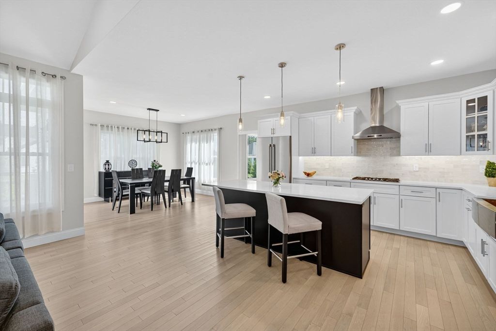 Dining room, Interior, Kitchen, Pendant Lights, Recessed Lighting, Stainless Steel Appliances, Wood Texture Flooring