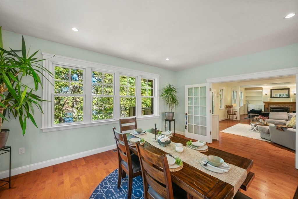 Dining room, Fireplace, Interior, Living room, Recessed Lighting, Wood Texture Flooring