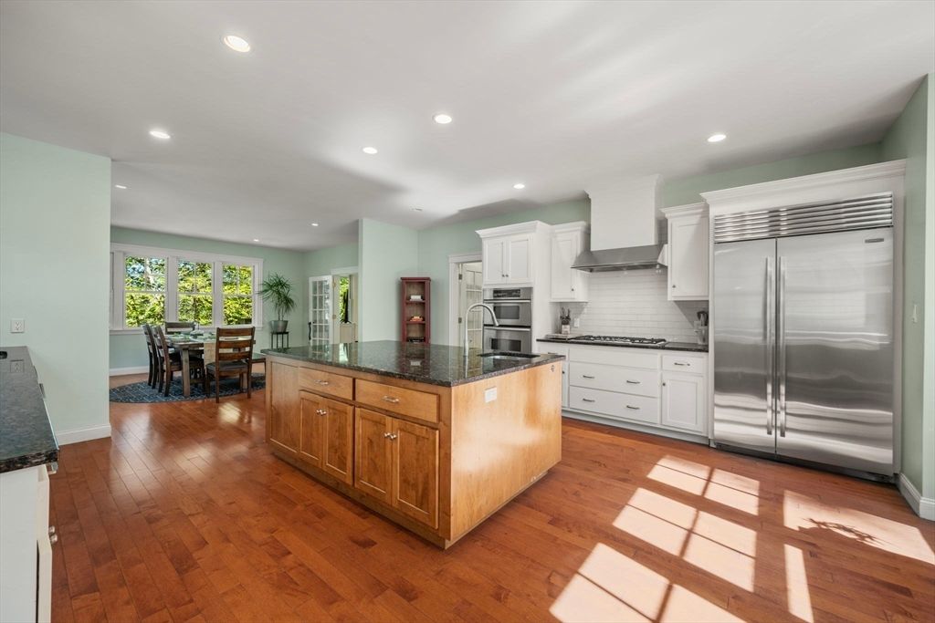 Dining room, Interior, Kitchen, Recessed Lighting, Stainless Steel Appliances, Wood Texture Flooring