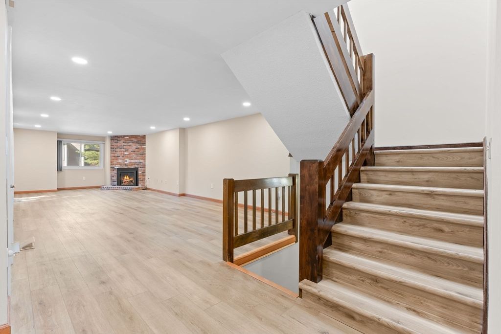 Empty room, Fireplace, Interior, Recessed Lighting, Wood Texture Flooring