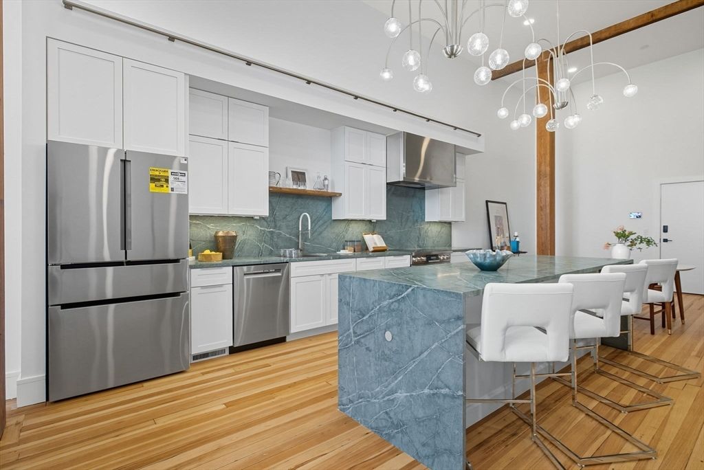 Dining room, Interior, Kitchen, Pendant Lights, Stainless Steel Appliances, Wood Texture Flooring