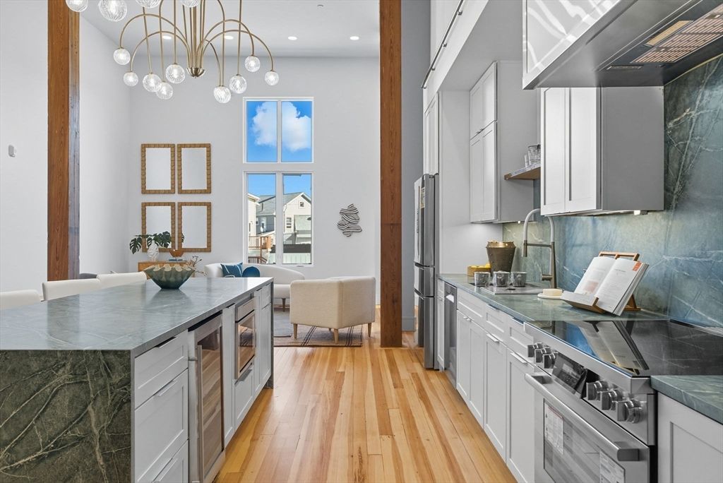 Dining room, Interior, Kitchen, Pendant Lights, Recessed Lighting, Stainless Steel Appliances, Wood Texture Flooring