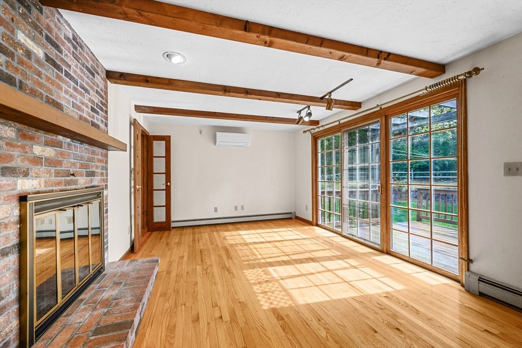 Empty room, Fireplace, Interior, Stone Walls, Wooden Beams, Wood Texture Flooring