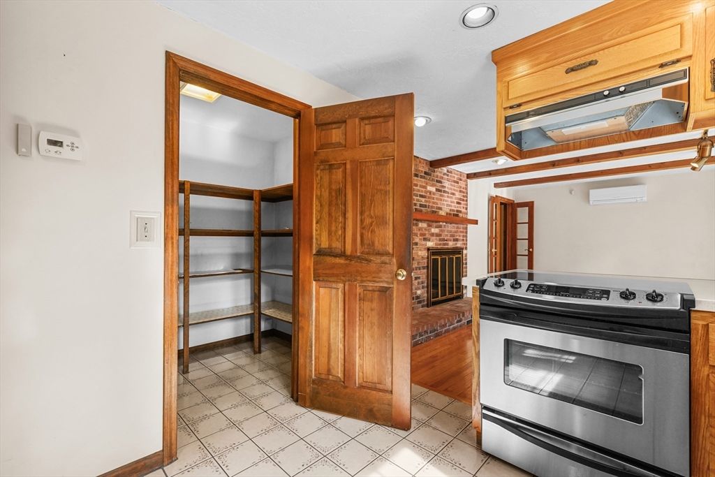 Fireplace, Interior, Kitchen, Recessed Lighting, Wood Texture Flooring