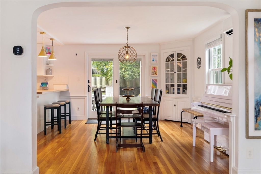 Dining room, Interior, Pendant Lights, Piano, Wood Texture Flooring