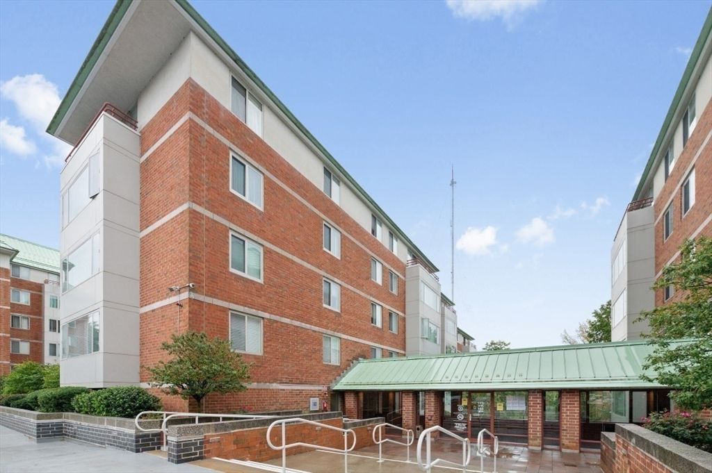 Exterior, Facade, Brick Facade, Condo Building