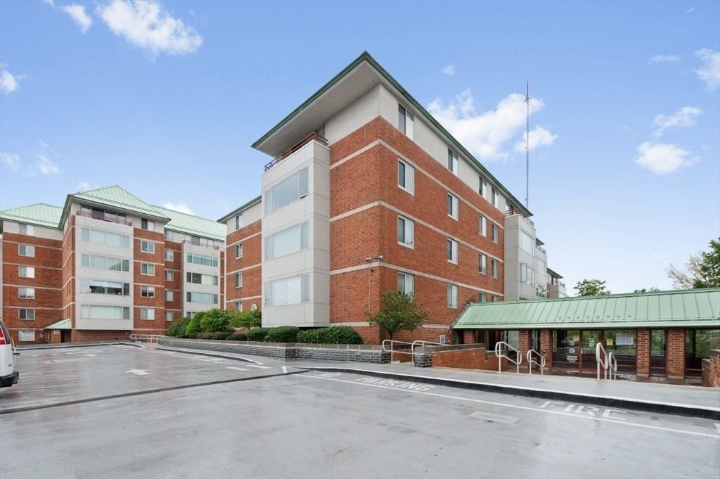 Exterior, Facade, Brick Facade, Condo Building