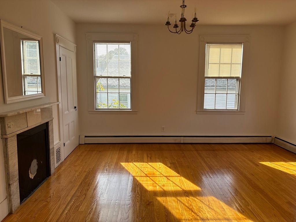 Chandelier, Empty room, Fireplace, Interior, Wood Texture Flooring