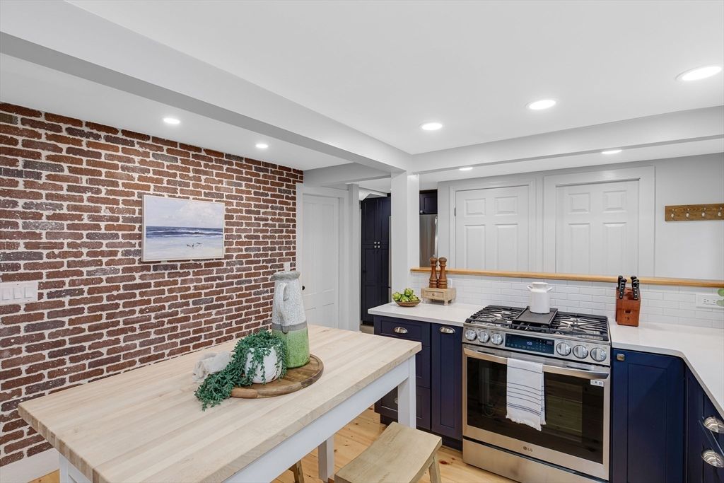 Interior, Kitchen, Recessed Lighting, Stainless Steel Appliances, Stone Walls, Wood Texture Flooring