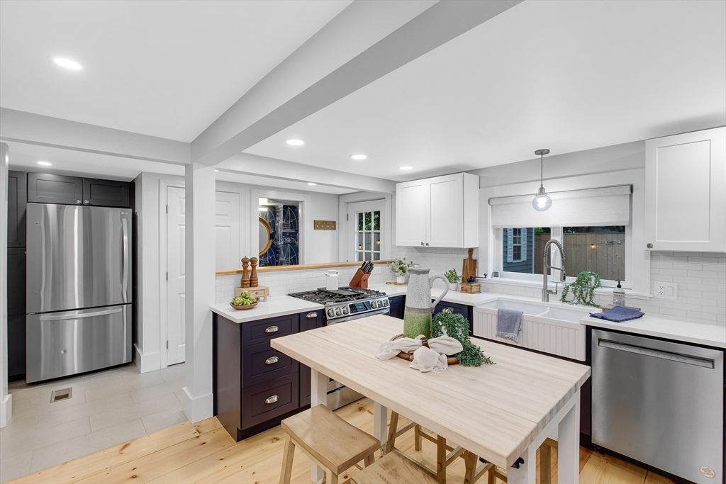 Dining room, Interior, Kitchen, Pendant Lights, Recessed Lighting, Stainless Steel Appliances, Wood Texture Flooring