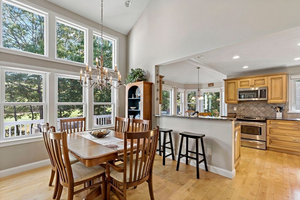 Chandelier, Dining room, Interior, Kitchen, Pendant Lights, Recessed Lighting, Stainless Steel Appliances, Wood Texture Flooring