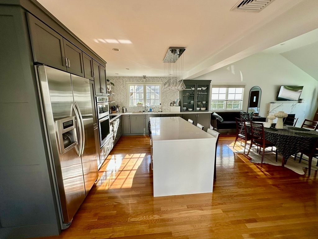 Dining room, Interior, Kitchen, Living room, Pendant Lights, Recessed Lighting, Stainless Steel Appliances, Wood Texture Flooring