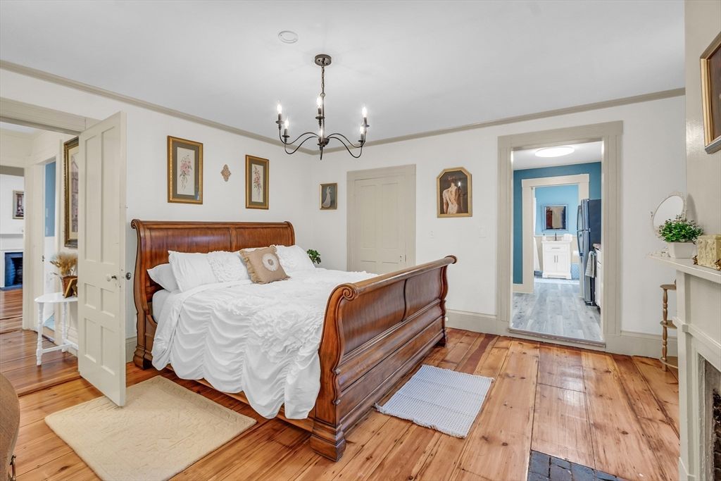 Bedroom, Chandelier, Fireplace, Interior, Wood Texture Flooring