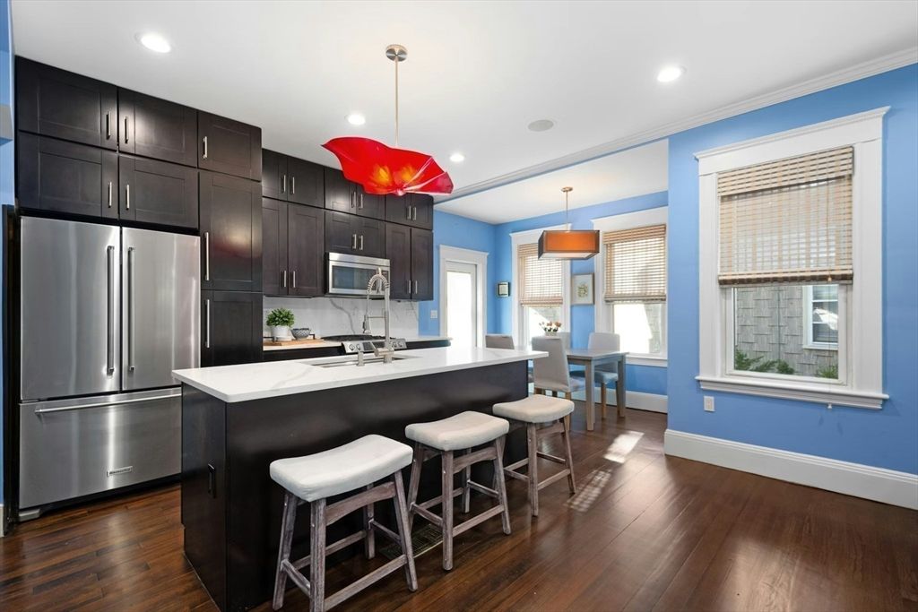 Dining room, Interior, Kitchen, Pendant Lights, Recessed Lighting, Stainless Steel Appliances, Wood Texture Flooring