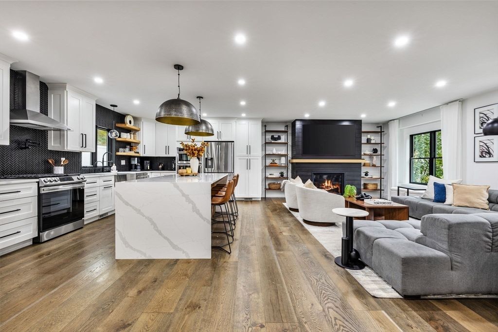 Fireplace, Interior, Kitchen, Living room, Pendant Lights, Recessed Lighting, Stainless Steel Appliances, Wood Texture Flooring