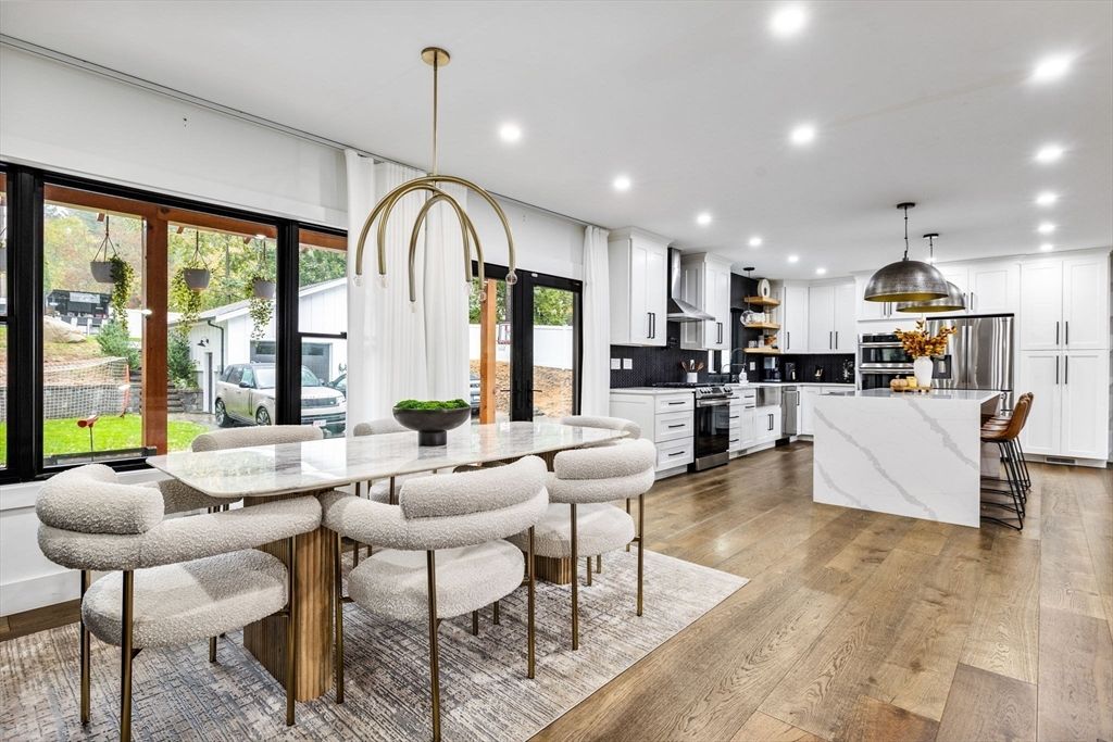 Dining room, Interior, Kitchen, Pendant Lights, Recessed Lighting, Stainless Steel Appliances, Wood Texture Flooring