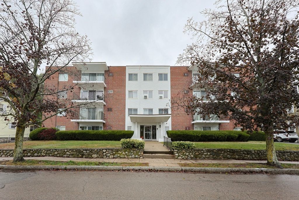 Exterior, Facade, Brick Facade, Condo Building