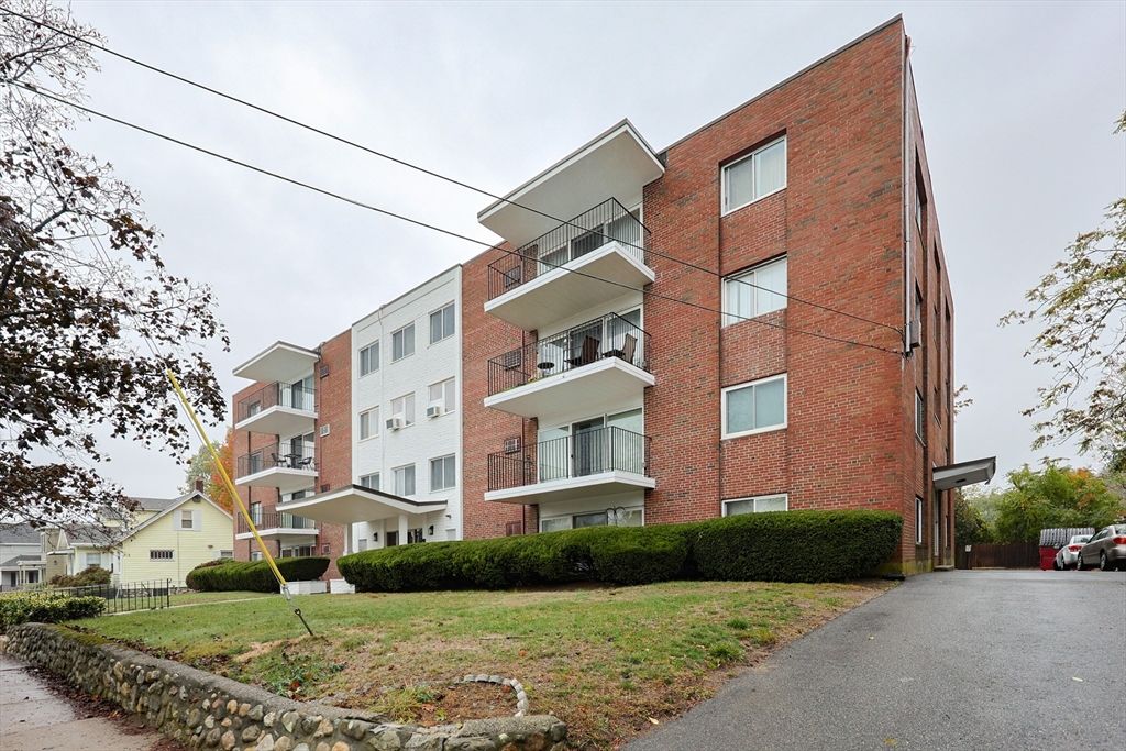 Exterior, Facade, Brick Facade, Condo Building