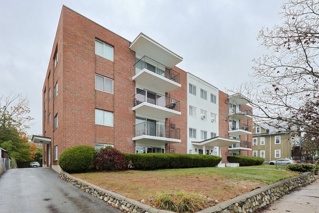 Exterior, Facade, Brick Facade, Condo Building