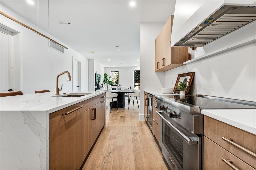 Dining room, Interior, Kitchen, Recessed Lighting, Stainless Steel Appliances, Wood Texture Flooring