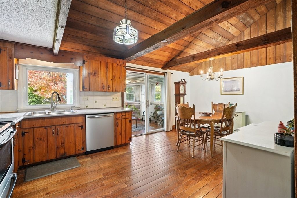 Chandelier, Dining room, Interior, Kitchen, Pendant Lights, Stainless Steel Appliances, Wooden Beams, Wooden Ceilings, Wood Texture Flooring