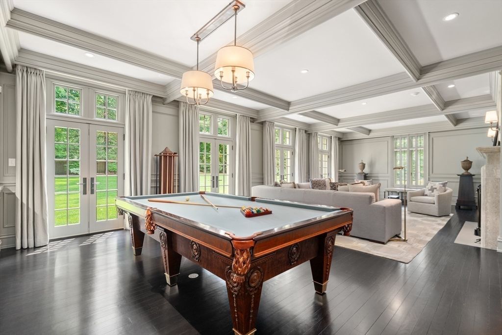 Billiard Table, Chandelier, Fireplace, Game Room, Interior, Living room, Recessed Lighting, Wood Texture Flooring