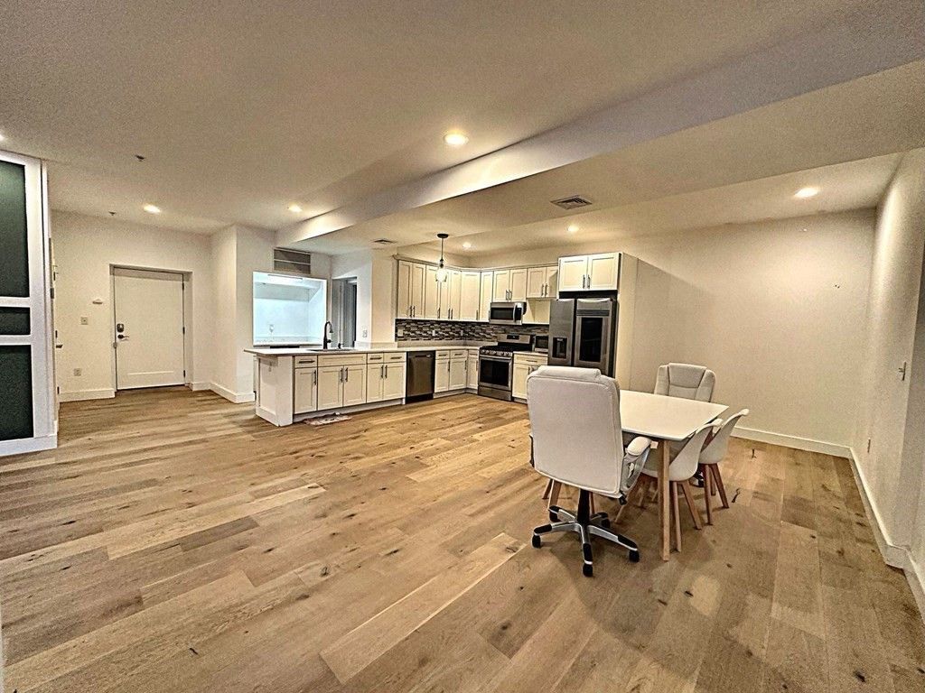 Dining room, Interior, Kitchen, Recessed Lighting, Stainless Steel Appliances, Wood Texture Flooring