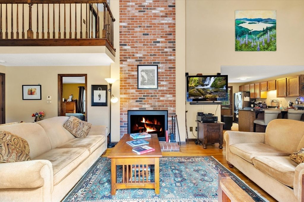 Fireplace, Interior, Kitchen, Living room, Recessed Lighting, Stone Walls, Wood Texture Flooring