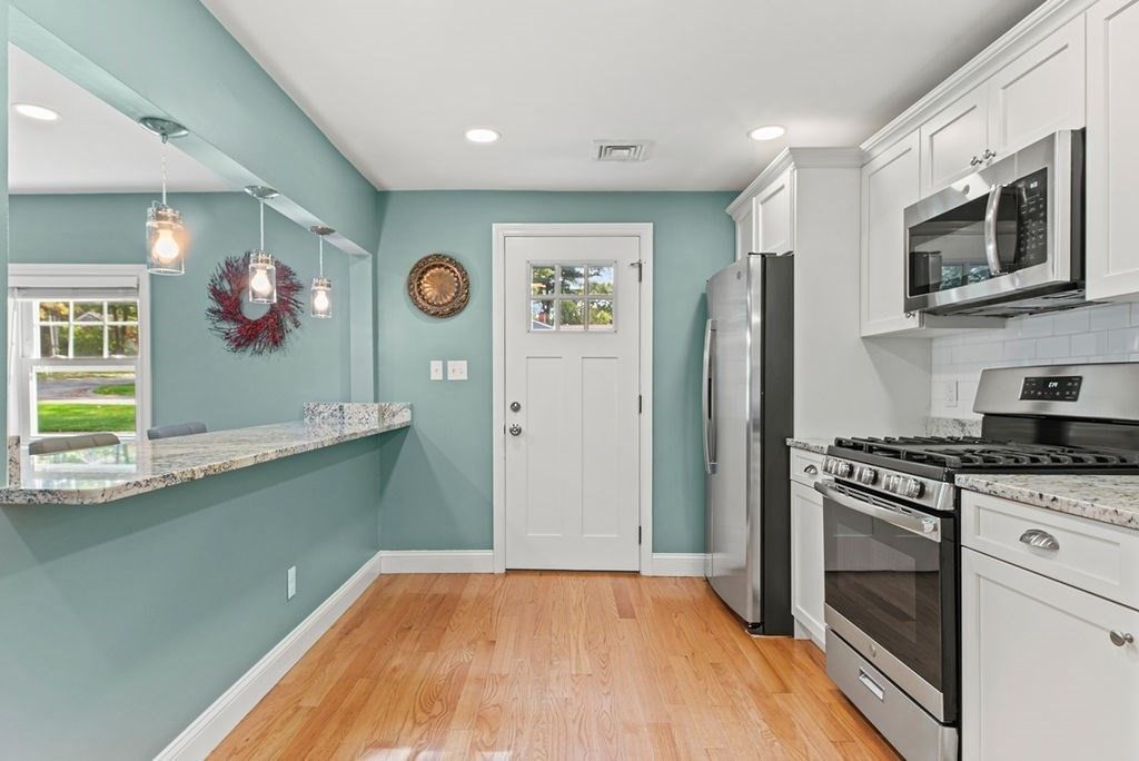 Interior, Kitchen, Pendant Lights, Recessed Lighting, Stainless Steel Appliances, Wood Texture Flooring