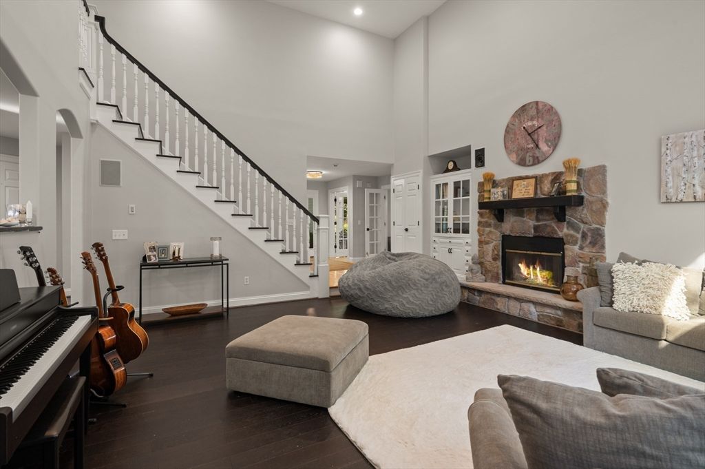 Fireplace, Interior, Living room, Piano, Recessed Lighting, Wood Texture Flooring