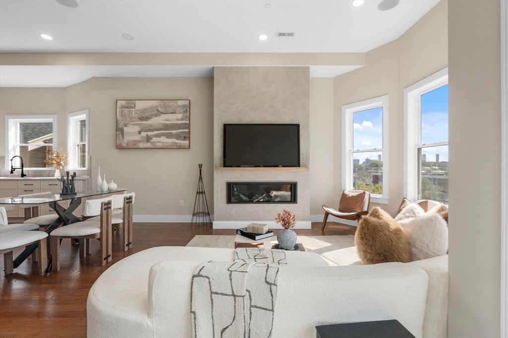 Dining room, Fireplace, Interior, Living room, Recessed Lighting, Wood Texture Flooring