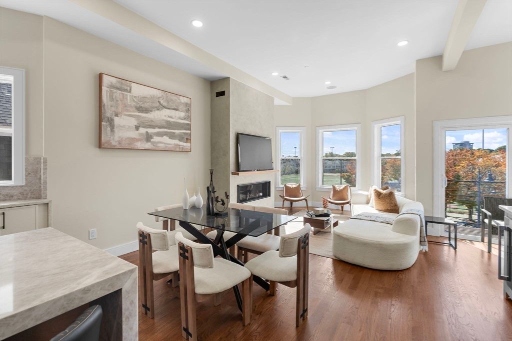 Dining room, Fireplace, Interior, Living room, Recessed Lighting, Wood Texture Flooring
