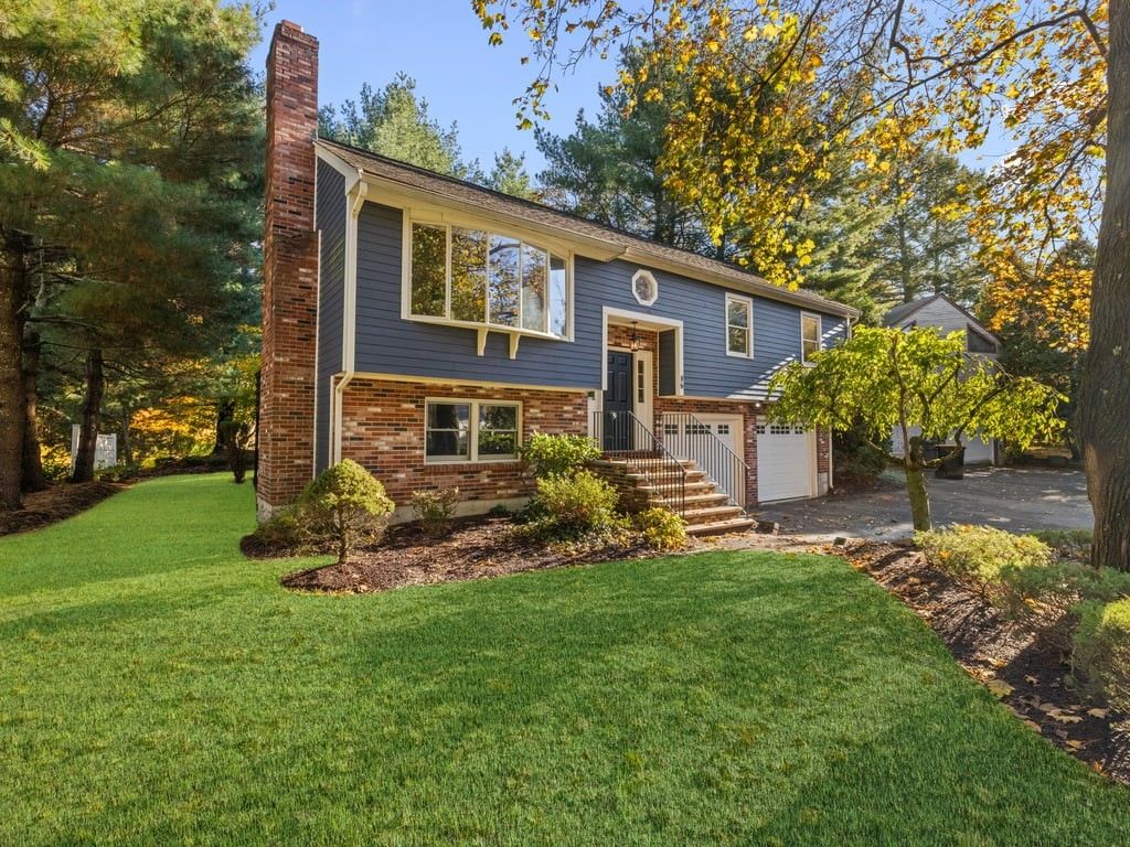 Attached, Backyard, Exterior, Facade, Brick Facade, Raised Ranch