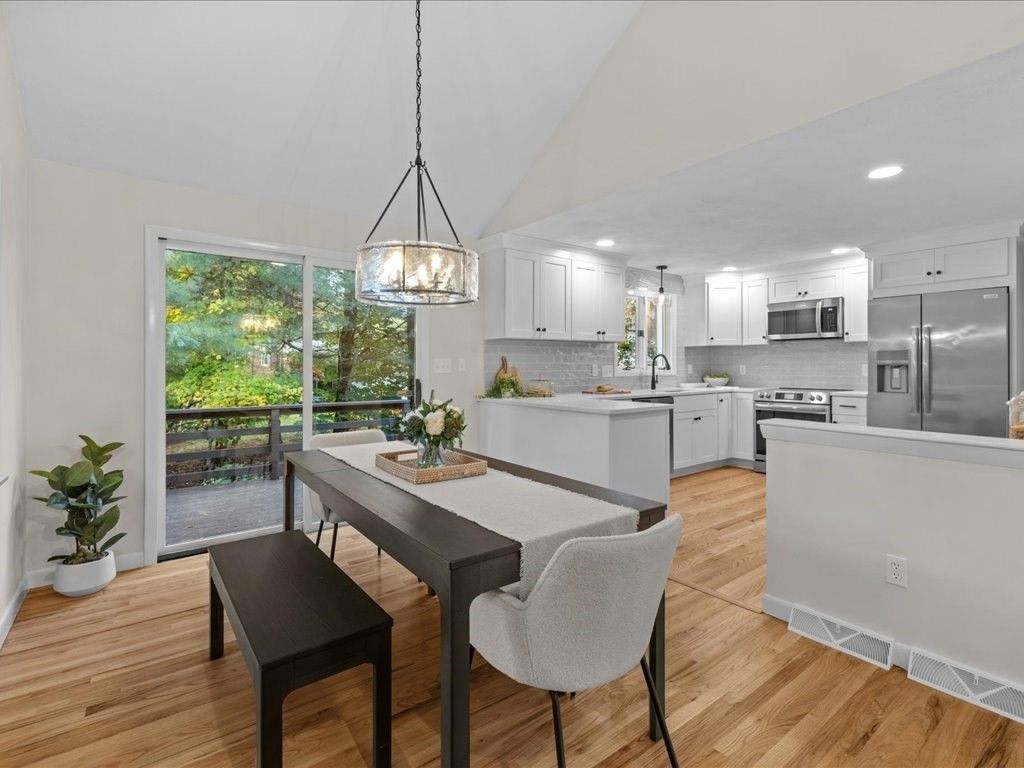 Dining room, Interior, Kitchen, Pendant Lights, Recessed Lighting, Stainless Steel Appliances, Wood Texture Flooring